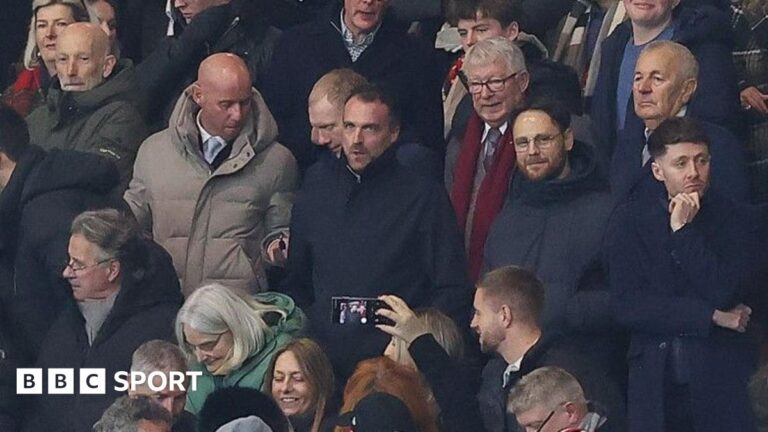 Manchester United: The club’s complicated relationship with the Class of 92 Nicky Butt (grey coat) and Paul Scholes to his left sat with former manager Sir Alex Ferguson (red scarf) at Manchester United's FA Cup defeat by Brighton