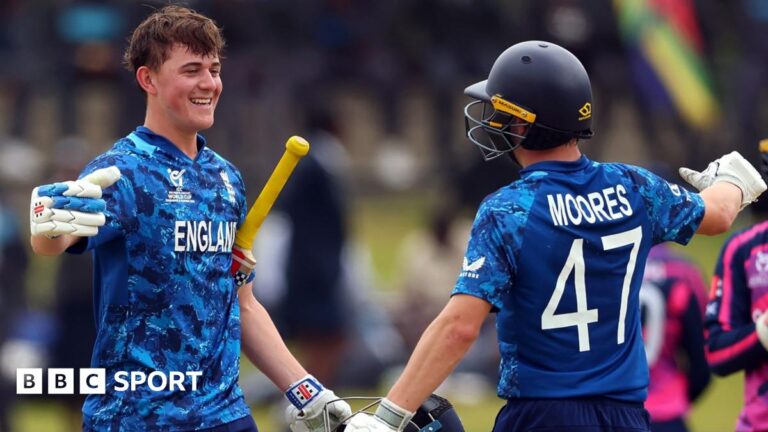 Ben Mayes is congratulated by Joe Moores
