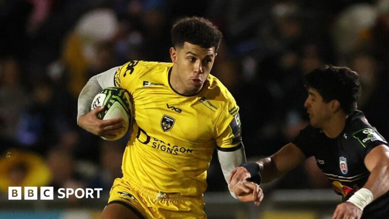 Rio Dyer dives to score a try for Dragons against Newcastle