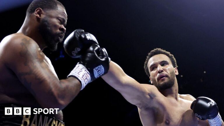 Moses Itauma celebrates as Jermaine Franklin is on the canvas