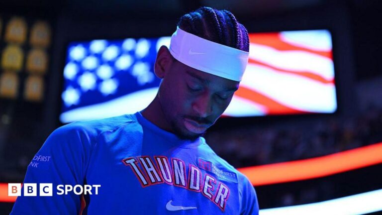 NBA play-offs: LA Lakers one game from exit as Thunder and Cavs win Shai Gilgeous-Alexander of Oklahoma City Thunder in a blue team leisurewear top and white headband, with his head bowed