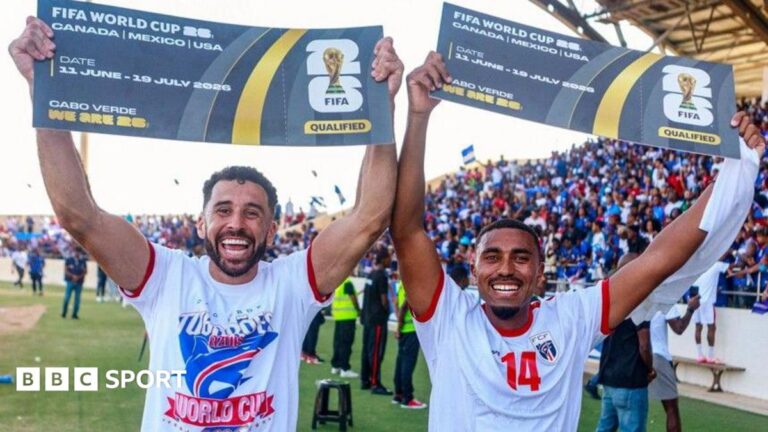 Roberto Lopes (left) celebrates Cape Verde's World Cup qualification with  Deroy Duarte after victory over Eswatini