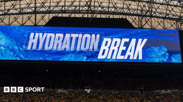 World Cup 2026: Gianni Infantino says hydration breaks bring no extra revenue for Fifa’ Television screen inside a stadium shows the words "hydration break" at the World Cup