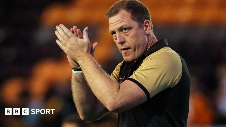 Ryan Carr applauds the Castleford Tigers fans after a game