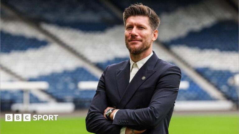Sebastien Pocognoli poses for photographs at Hampden Park