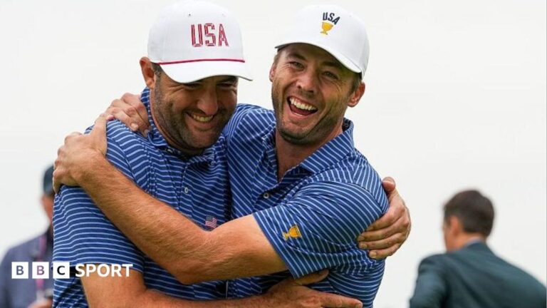 Scottie Scheffler and Sam Burns celebrate