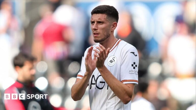 Ross Stewart applauds after his Swansea debut