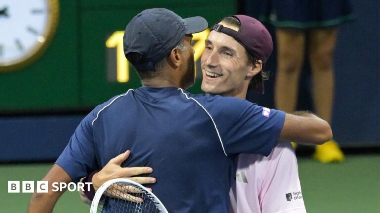Joe Salisbury (right) hugs doubles partner Rajeev Ram